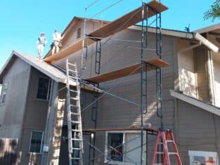 Scoffolding for construction work being completed contractors a residence