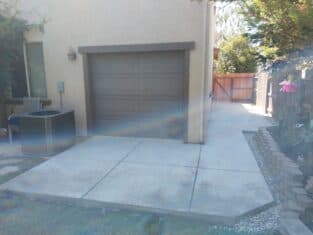 Garage door with newly paved walkway